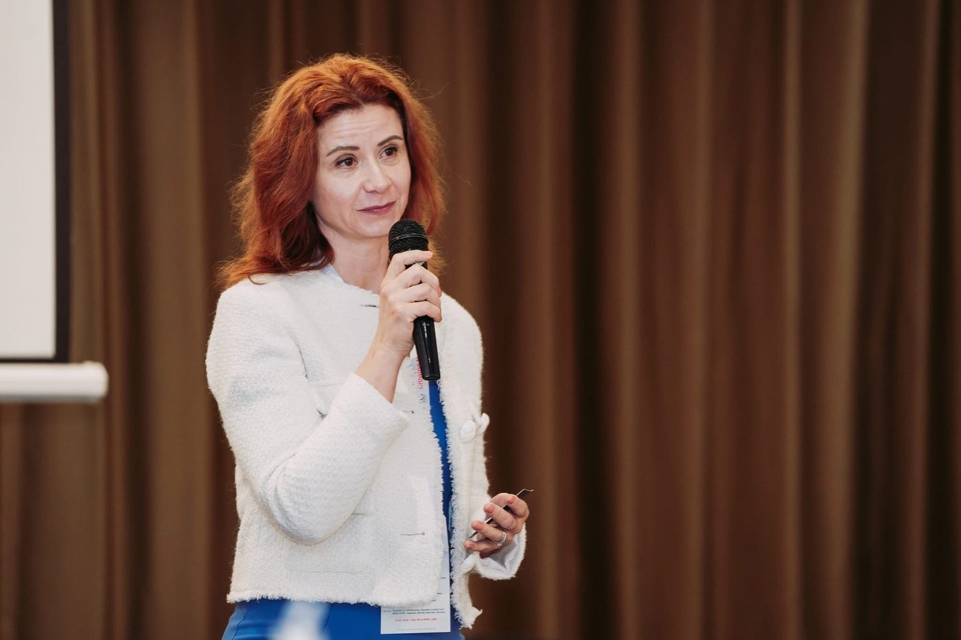 Kinga Kroth-Madarász on stage at Business Beyond Borders